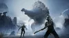 Two warriors in armor facing a giant, monstrous creature in a snowy, desolate landscape with ruins. Produktbild-Vorschau