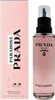 A pink box and a clear glass bottle of Prada Paradoxe perfume. Náhled obrázku produktu