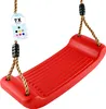 A red swing seat with ropes hanging from above, against a white background. Produktbild-Vorschau