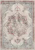 A top-down view of a rug with a distressed, vintage-inspired pattern. Produktbild-Vorschau