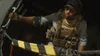 A soldier in tactical gear is holding onto a cable inside what appears to be a helicopter or aircraft. Produktbild-Vorschau