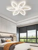 A bedroom with a modern ceiling light fixture. Produktbild-Vorschau