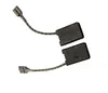 Two carbon brushes with wires and connectors, isolated on a white background. Voir les images du produit