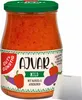A jar of Ajvar spread with vegetables on a white background. Produktbild-Vorschau