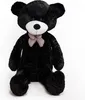 A large black teddy bear sitting on a white background. Podgląd zdjęcia produktu