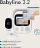 A baby monitor and camera set with inset images showing a baby sleeping. Anteprima dell’immagine prodotto