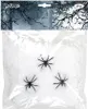 A product package containing fake spider webs and three plastic spiders for Halloween decoration. Produktbild-Vorschau