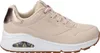A side view of a beige Skechers sneaker. Anteprima dell’immagine prodotto
