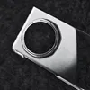 A close-up shot of a transparent phone case with a circular cutout for a camera lens. Produktbild-Vorschau