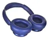 A pair of blue over-ear headphones is shown against a white background. Náhled obrázku produktu