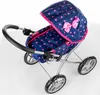 A toy doll stroller on a white background. Produktbild-Vorschau
