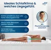 Marketing image showing a person lying on a mattress with text overlays highlighting product features and a physiotherapist's endorsement. Voir les images du produit