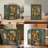 A collage of four images showing a DIY book nook model with intricate details and a gothic architectural style, presented on different surfaces and angles. Náhled obrázku produktu