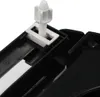 A close-up view of a black toilet seat hinge mechanism with a white plastic bolt and nut. Produktbild-Vorschau