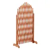 A wooden garden screen with an arched top, standing on a white background. Podgląd zdjęcia produktu