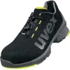 A black safety shoe with gray and yellow accents, shown from a side-angle against a white background. Anteprima dell’immagine prodotto
