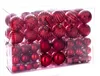 A clear, well-lit product shot of a box filled with red Christmas ornaments. Podgląd zdjęcia produktu