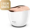 A white ultrasonic aroma diffuser with a rose gold top, set against a white background. A gold overlay in the top left corner indicates a promotion. Produktbild-Vorschau