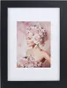 A framed picture of a woman adorned with roses. Produktbild-Vorschau