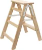 A wooden stepladder is shown against a white background. Produktbild-Vorschau