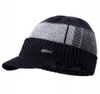 A close-up studio shot of a winter hat with a visor. Produktbild-Vorschau
