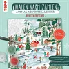 A painting by numbers kit for an advent calendar with a winter wonderland theme, showing the painting in progress and the included paints and brush. Produktbild-Vorschau