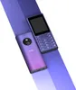A purple and blue feature phone is shown against a white and light purple background. Náhled obrázku produktu