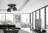 A modern living room with a large window overlooking a city skyline. Produktbild-Vorschau