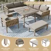 An outdoor patio furniture set arranged on a rug. Produktbild-Vorschau