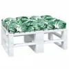 A white pallet bench with a green leaf-patterned cushion on top, presented against a white background. Produktbild-Vorschau