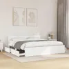 A white bed frame with drawers is shown in a bedroom setting. Anteprima dell’immagine prodotto