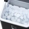 A close-up view of the interior of an ice maker filled with ice cubes. Produktbild-Vorschau