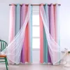 A close-up view of colorful, double-layered curtains with sheer overlay, hanging from a curtain rod. Voir les images du produit