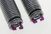 Close-up of two garage door springs with purple accents. Produktbild-Vorschau