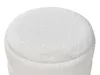 A close-up, top-down view of a white, round ottoman or footstool with a textured fabric surface. Náhled obrázku produktu