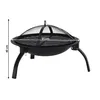 A black portable fire pit with a mesh lid and legs, shown with measurement indicators. Náhľad obrázku produktu