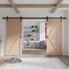 A room with two sliding barn doors, a desk with shelves, and a rug. Produktbild-Vorschau