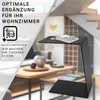 A modern living room setting with a black C-shaped side table. Produktbild-Vorschau