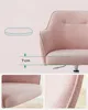 Close-up views of a pink fabric armchair with dimensional information. Náhled obrázku produktu
