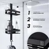 A black shower organizer with two shelves and hooks, filled with bottles and a loofah, displayed in a shower stall. Produktbild-Vorschau