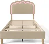 A beige upholstered bed frame with a scalloped headboard featuring pink LED lighting, shown from the front on a white background. Náhled obrázku produktu