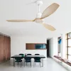 A modern dining room with a sleek black table and chairs, a wooden accent wall, and a white ceiling fan with wooden blades. Náhled obrázku produktu
