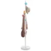 A white coat rack with colorful knobs holding a hat, a jacket, and a purse. Anteprima dell’immagine prodotto