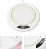 A white circular cup warmer with a digital display showing the temperature. Produktbild-Vorschau