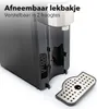 A close-up product shot of a black appliance with a removable drip tray placed beside it. Text overlay highlights features. Produktbild-Vorschau