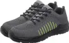 A pair of grey work shoes with black soles and laces, and yellow accents on the side. Voir les images du produit