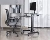A home office setup with a standing desk and chair. Voir les images du produit