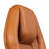 A close-up view of a brown leather office chair headrest and part of the backrest. Produktbild-Vorschau