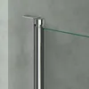 A close-up view of a shower screen hinge and glass panel against a textured gray wall. Produktbild-Vorschau