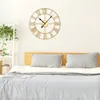 A bedroom scene with a bed and a wall clock. Voir les images du produit